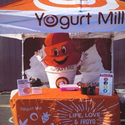 Yogurt mill stand with mascot